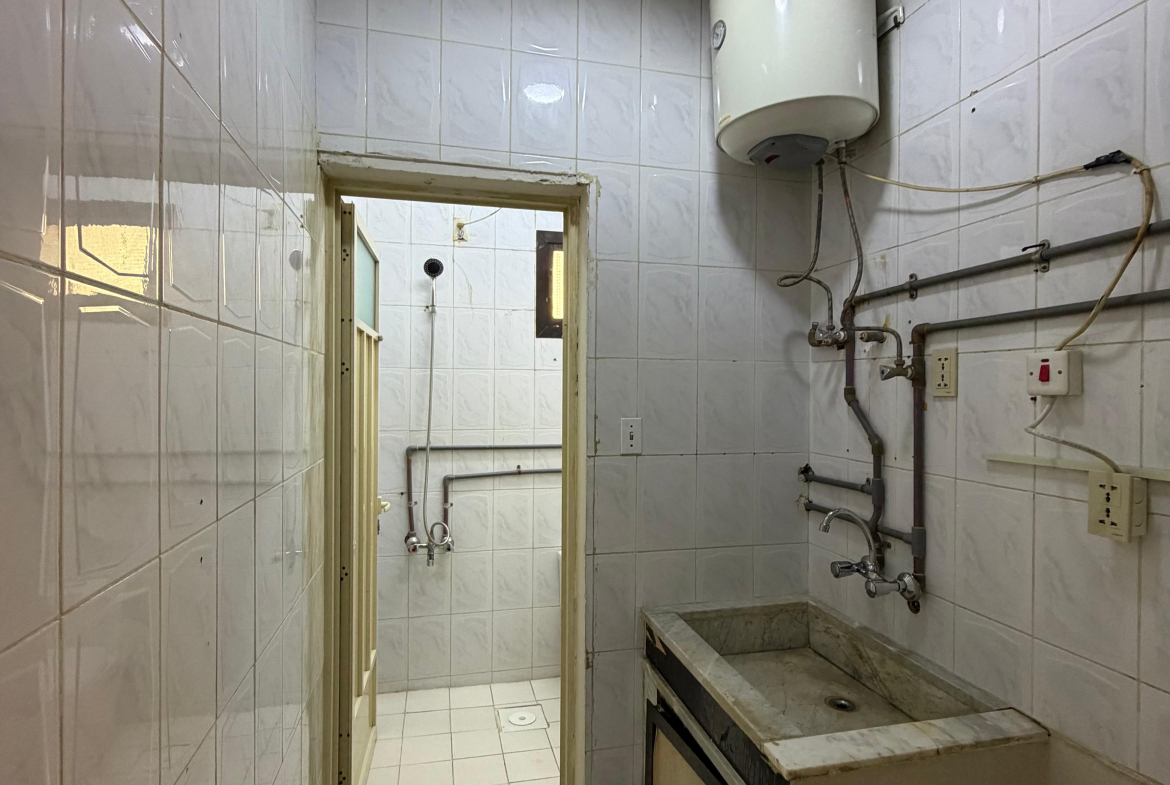 Building 309, Apartment 7